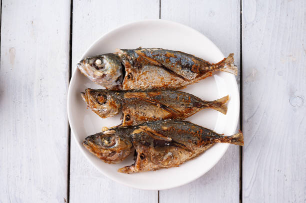 istock Deep fried mackerel with fish sauce, Traditional Thai food. 1223996643