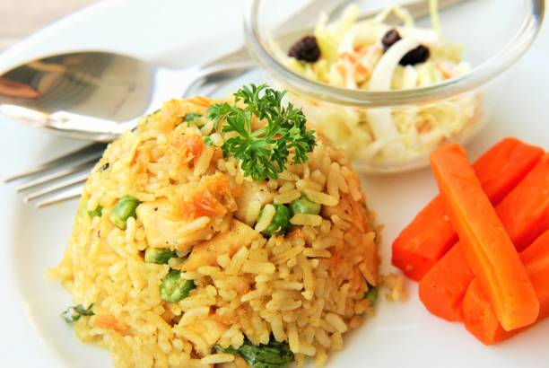 istock Fried rice mixed Thai spicy green curry sauce 1223998072