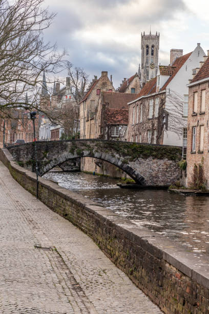 istock Buildings around channels and bridge in Bruges 1223998294