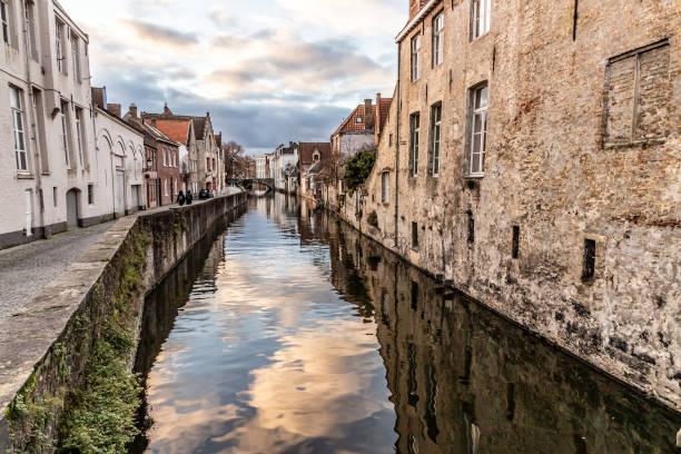 istock Buildings around channels in Bruges at sunset 1223998460