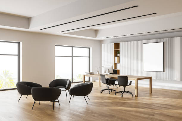 istock White CEO office corner with poster and lounge 1223999315