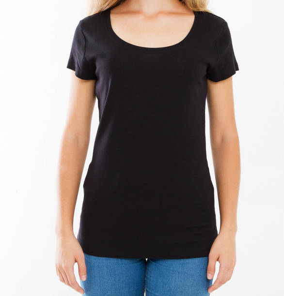 istock closeup black t shirt female isolation over white 1224000897