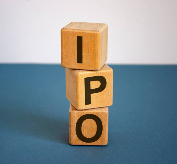 istock Concept word IPO on cubes on a beautiful blue background. Business concept. 1224003103