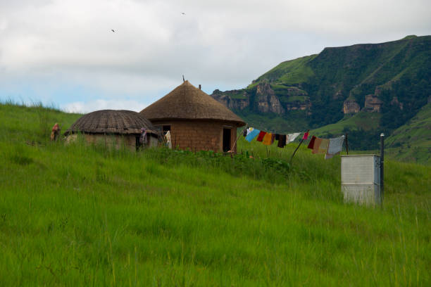 rural homestead with pit latrine in drakensberg mountains, south africa rural homestead with pit latrine in drakensberg mountains, kwazulu natal, south africa bushveld photos stock pictures, royalty-free photos & images