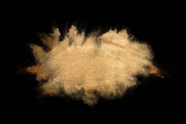 istock Set of dust powder splash clouds isolated on black background. sand explosion. 1224008055