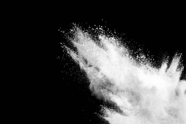 istock Freeze motion of white color powder exploding on dark background. 1224008281