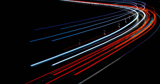 istock lights of cars with night 1224009269