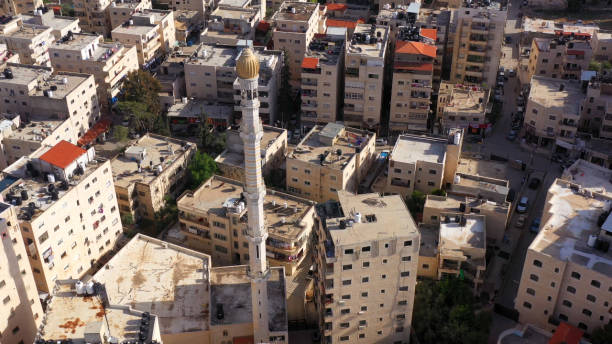 istock Mosque Tower minaret in Shuafat Refugee Camp, Jerusalem-Aerial View 1224009749