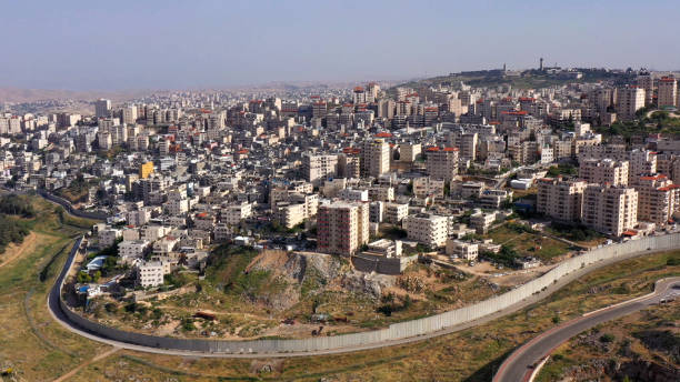 istock Israel and Palestine Divided By security Wall Aerial View 1224009766