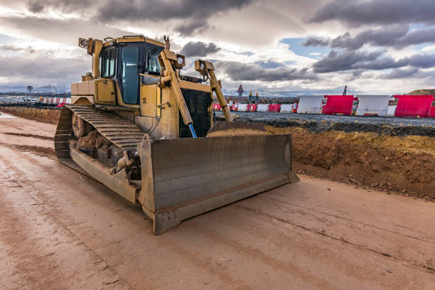 istock Excavator on the road construction works 1224010895