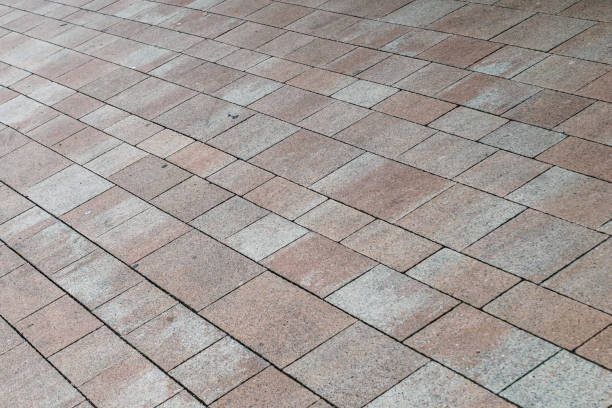 istock pavement of brown cobblestones. texture. 1224012366