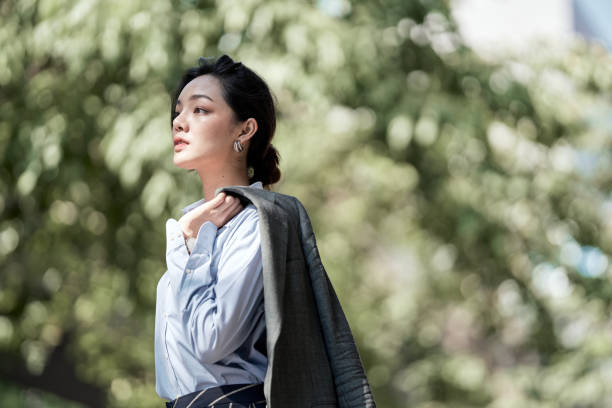 istock A beautiful Asian business woman is looking forward for her future. 1224013295