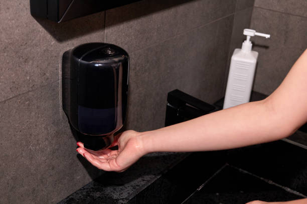 istock Woman washing hands, applying liquid soap. 1224015011