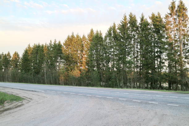 istock paved road in the countryside 1224016091