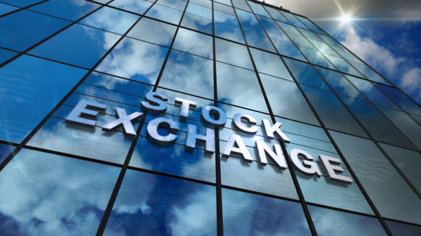istock Stock Exchange glass skyscraper with mirrored sky 1224023355