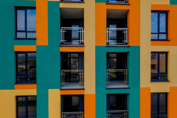 Detail facade with windows. Simple high-rise residential typical building.