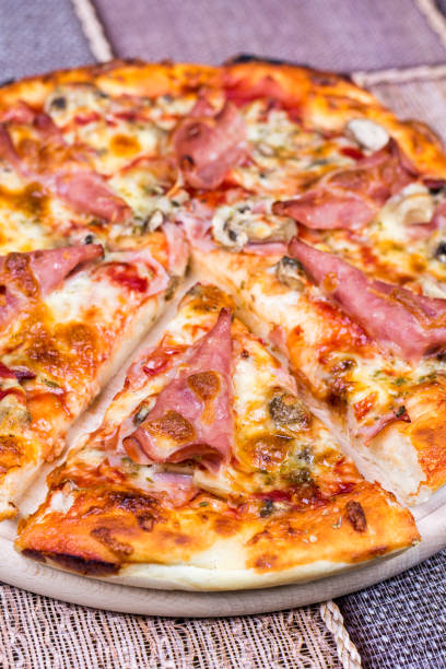 istock Flay lay view pizza with ham cheese mushrooms 1224025019