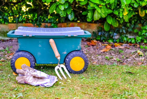 istock Spring time gardening - gloves and a weeding fork 1224026986