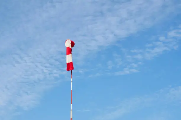 Windsock against a blue sky - calm