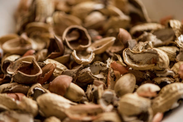 shelled peanuts, cut in half