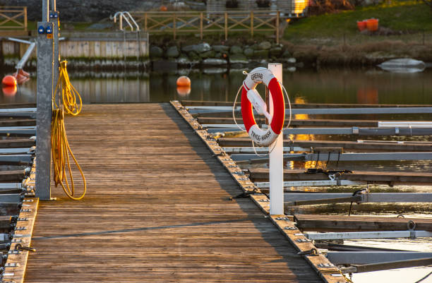 Gothenburg, Sweden – march 26 2020: Lifebuoy on a pier at a marina..