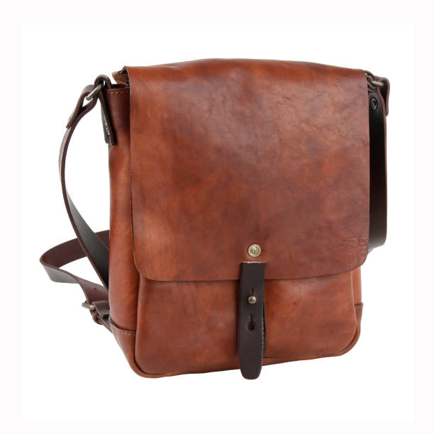 istock New bag in light brown leather. Isolated on white 1224030019