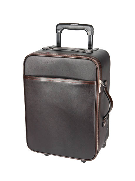 istock Dark brown travel suitcase isolated on white 1224030029
