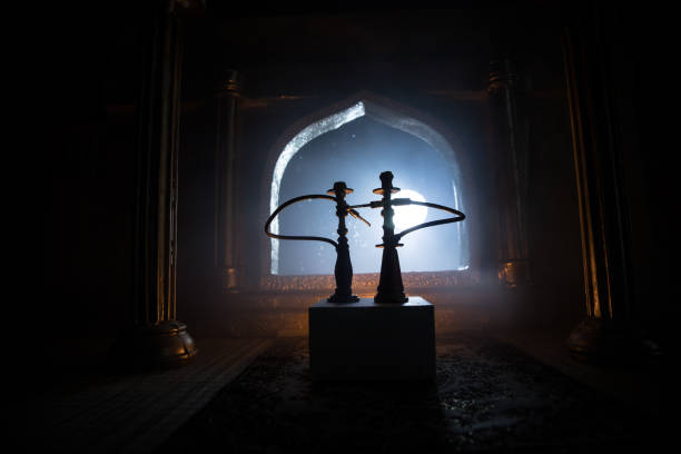 istock A realistic Arabian interior miniature with window and columns. Hookah hot coals on shisha bowl making clouds of steam. Stylish oriental shisha miniature 1224031166