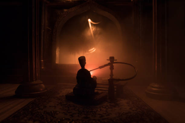 istock A realistic Arabian interior miniature with window and columns. Hookah hot coals on shisha bowl making clouds of steam. Stylish oriental shisha miniature 1224031182