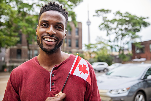 Handsome black Toronto man celebrating Canada day