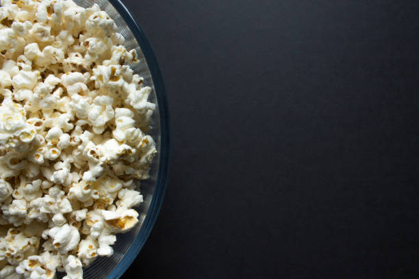 istock Popcorn close up in a clear glass Cup 1224035010