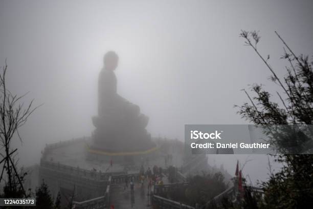 Large Buddha Statue In The Fog At The Phan Xi Pang Summit Sa Pa Vietnam Stock Photo - Download Image Now