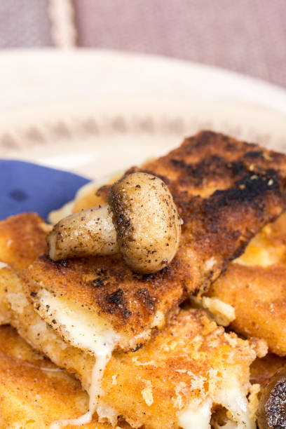 istock Fried mushroom with fried yellow cheese on eggs 1224036260
