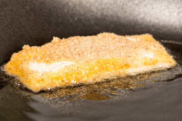 istock Frying fried yellow cheese with eggs in frying pan 1224036325