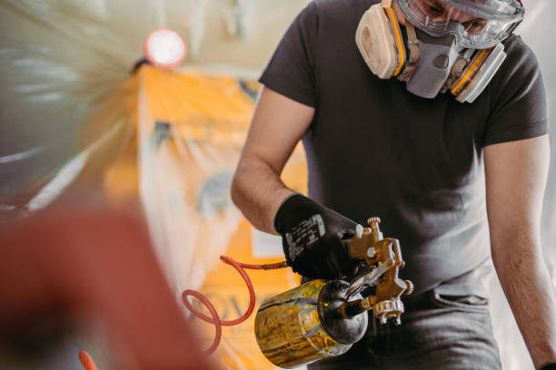 istock Painting cabinets with spray gun 1224037488