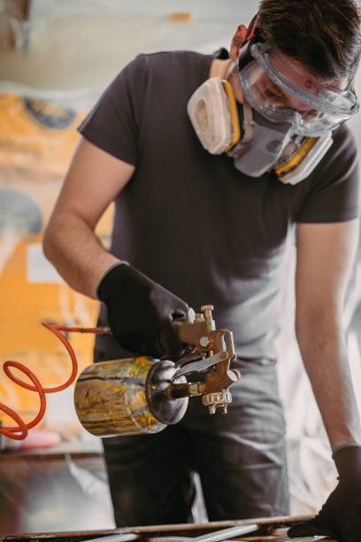 istock Painting cabinets with spray gun 1224037589