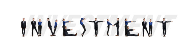 istock Group of people forming investment word at studio 1224041119