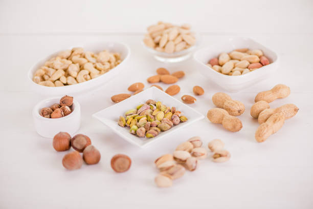 healthy snack selection on white wood background