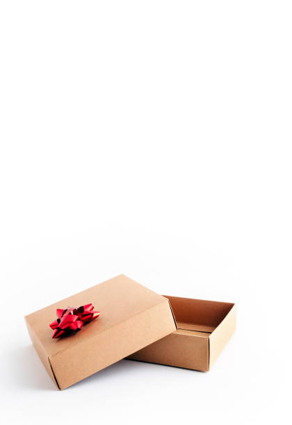istock cardboard gift box with red ribbon 1224045144