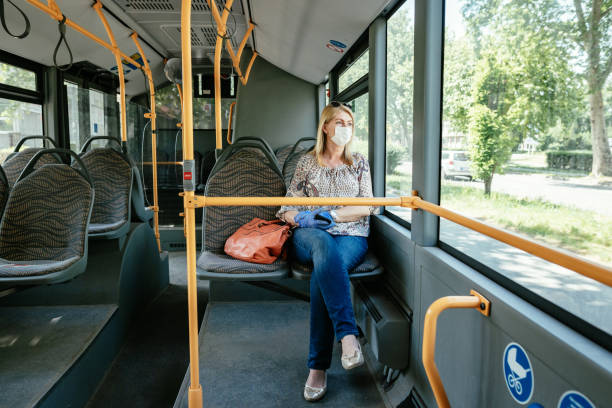 istock Essential worker in public transportation, looking through the window during the ride 1224053308
