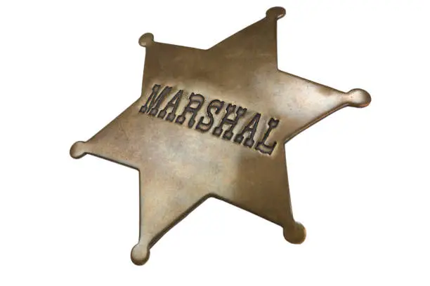 Old Western-style marshal badge isolated on white background