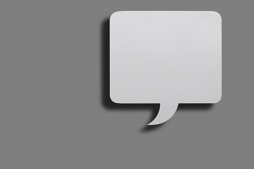 White, rectangular Chat Bubble On Grey Background.\nInclude clipping path.