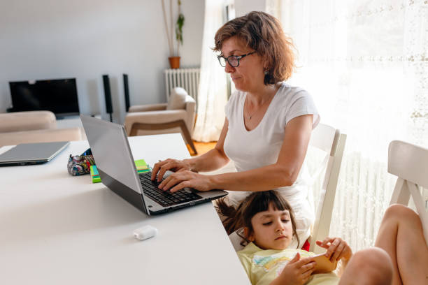 istock Busy Mother Working From Home 1224059213