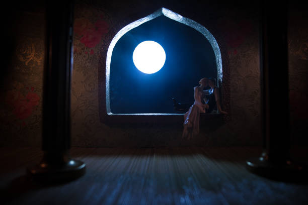 istock Beautiful arabian interior realistic miniature. Table decoration. Romantic couple at window. 1224063977