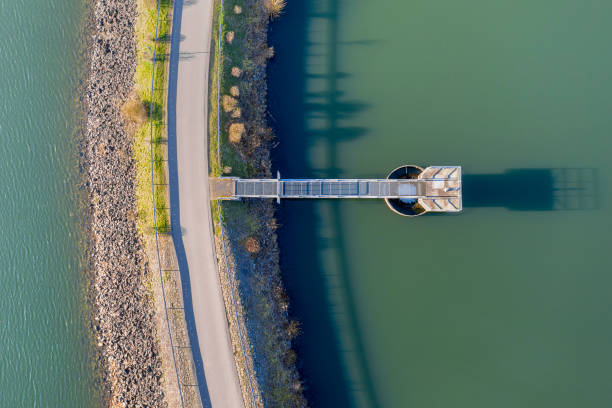 istock stone water dam and overflow in the sun from above 1224064813