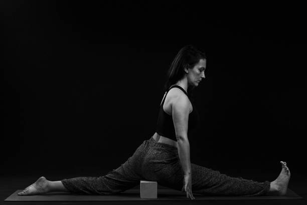 istock Yoga on black background 1224067229