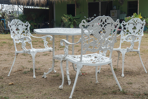 white outdoors table and chair set for outdoor garden at home