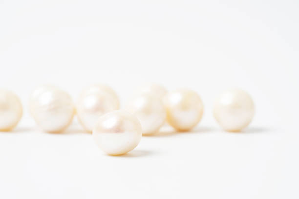 istock pearl necklace isolated on white blackground 1224073053