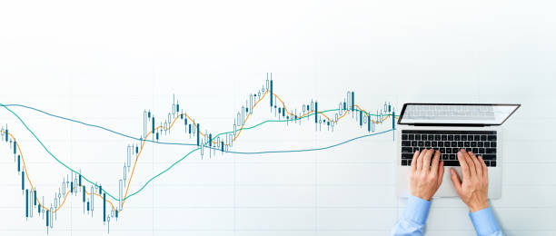 istock Stock market analysis. Candlestick chart and laptop. 1224077243
