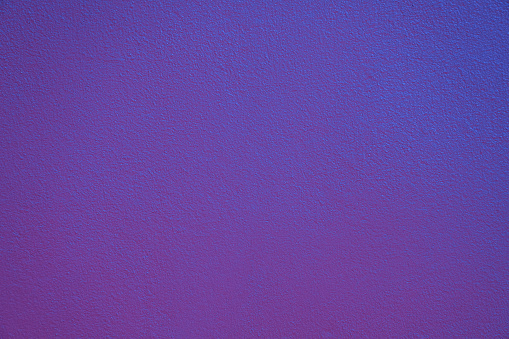 Blue violet vibrant color wall background.